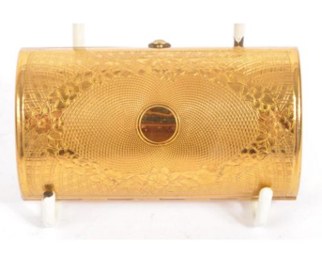 Kigu - A vintage 20th century circa 1950s gilt metal ladies pocket compact. The case having engine turned decoration, and bei