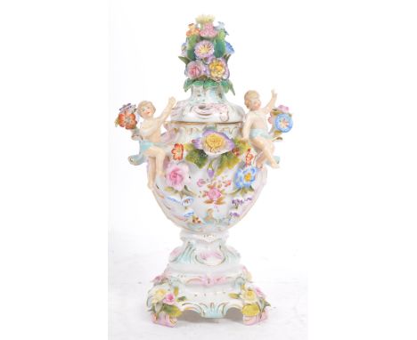 A late 19th century Chelsea Pottery style lidded porcelain posy vase / pot pourri vessel.&nbsp;With flamboyant floral and che