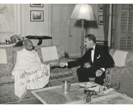 GANDHI (M. K., 'MAHATMA')Photograph of Mahatma Gandhi seated with Sir Richard Casey, Governor of Bengal during their meeting 