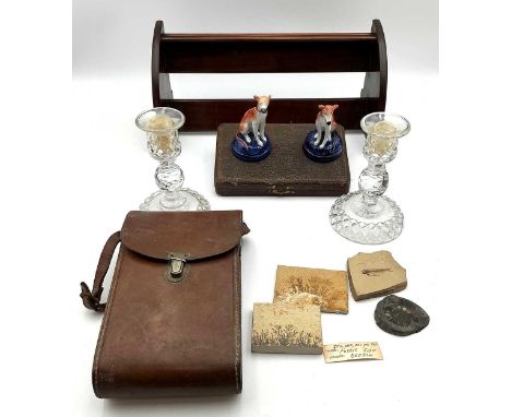 An inlaid mahogany book stand with Art Nouveau style inlaid end panels; a silver handle manicure set; a folding camera in a l