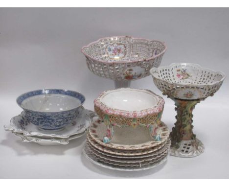 A 19th century Continental pierced porcelain basket on stand or table centre; another with Meissen style crossed swords mark,