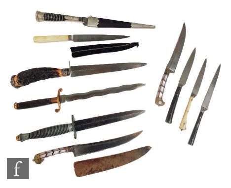 A Fairbairn Sykes post war type three fighting knife, unmarked 15cm blade, a horn handled hunting knife and eight other small