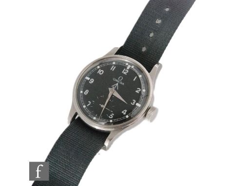 A military issue Omega manual wind wrist watch, Arabic numerals to a black dial, movement numbered 10276474, case diameter 35