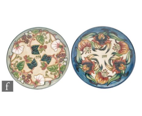 Two Moorcroft Pottery wall Year plates, the first for 1998, decorated in the Summers End pattern designed by Rachel Bishop, t
