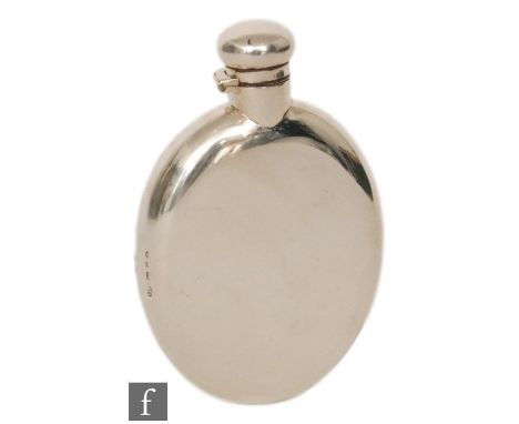 A late 19th Century hallmarked silver oval hip flask of plain form, terminating in bayonet cap, length 15cm, weight 5oz, Birm