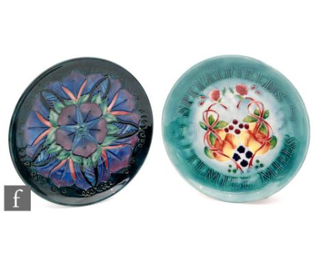 Two Moorcroft Pottery wall plates, the first for Spitalfields Temple Mills 1991, impressed mark with the City of London print