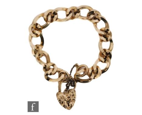 A 9ct hallmarked solid curb and ring link bracelet terminating in padlock fastener, weight 47.5g. 
