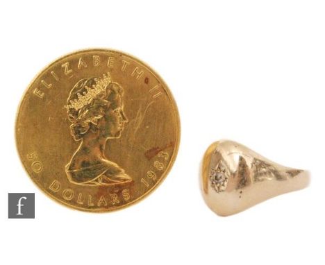 An Elizabeth II Canada fifty dollar 1oz gold coin dated 1983, with a 9ct signet ring, weight 5.2g. (2) 