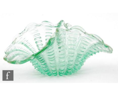 A post war Italian Murano glass bowl by Barovier &amp; Toso of fluted form with petal edged folded rim, in pale green with go