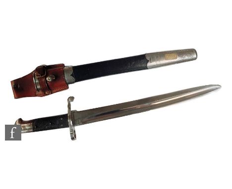 A British 1853 pattern bayonet and scabbard with leather frog. 