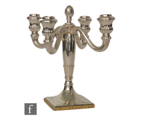 A German silver four light candelabra, square base below flaring column and central pineapple finial, height 25cm, weight 21g