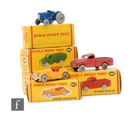 A collection of five Dublo Dinky diecast models, comprising 062 Singer Roadster with orange body and smooth wheels, 064 Austi