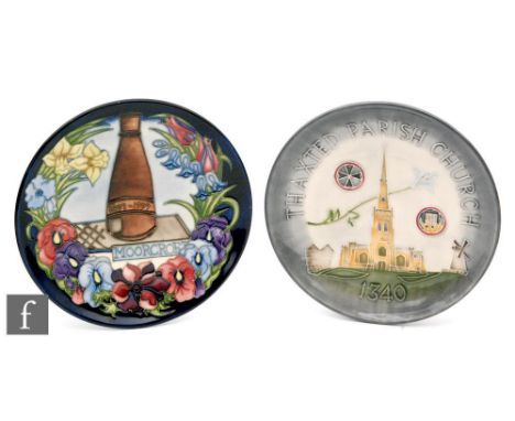 Two Moorcroft Pottery wall plates, the first for Thaxted Parish Church 1340 and the second for Moorcroft Centennial 1897 to 1
