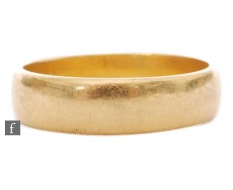 A 22ct hallmarked D shaped wedding ring, weight 3.5g, ring size K. 