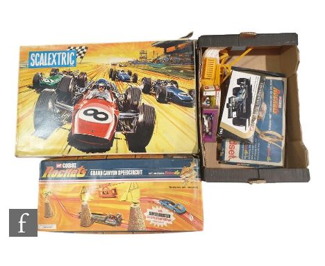 A collection of assorted toys to include a Scalextric Grand Prix 75 set, a Corgi 190 JPS Lotus Formula 1, a Corgi 156 Graham 