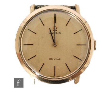 A gentleman's 9ct Omega De Ville manual wrist watch, batons to a circular champagne dial, movement numbered 35238886, diamete
