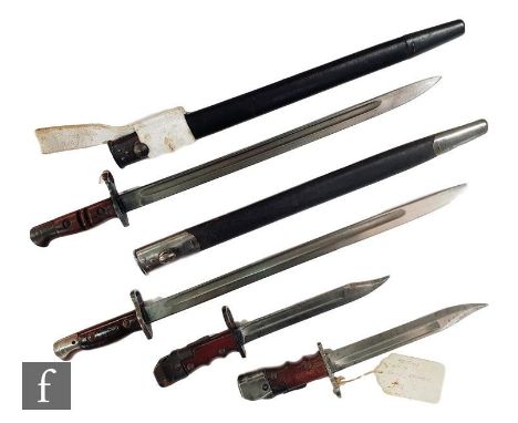 A 1907 pattern bayonet and scabbard, a 1913 English pattern bayonet and scabbard and two British knife bayonets. (4) 