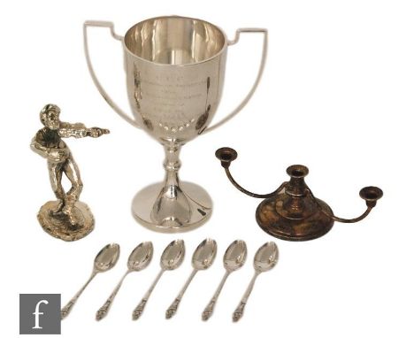 A hallmarked silver twin handled trophy cup with presentation engraving with a set of six silver apostle spoons, a squat thre