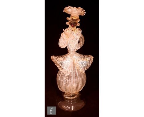 A 20th Century Murano glass figure of a dandy, the clear glass highlighted with gold and silver aventurine inclusions, applie