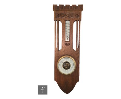 An early 20th Century Dutch carved oak aneroid barometer with thermometer with Secessionist style carving, the register signe