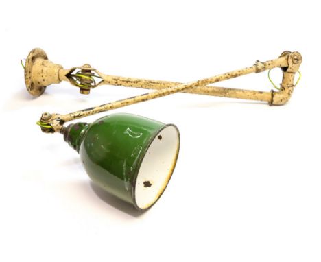 A 1940s Dugdills engineers lamp, articulated tubular iron, with original paint work and green enamelled shade

Please note:  