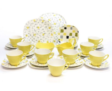 Jessie Tait for Midwinter a Savanna part tea set, including saucers, plates and yellow Fashion cups, jug and bowl, together w