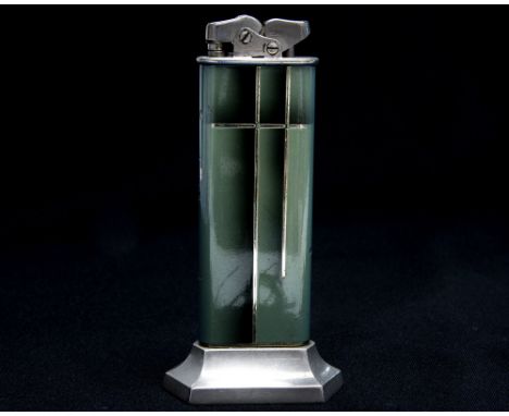 An Art Deco Thorens Oriflam table lighter, green enamelled metal, on faceted foot, marked to underside, Swiss Made, registrat