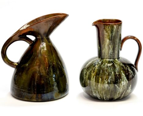 Christopher Dresser for Linthorpe, an art pottery jug with incised Egyptian style design on a conical body with integrated lo