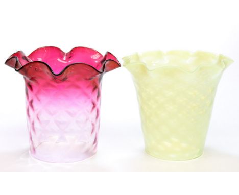 An Arts and Crafts straw opal glass shade, lattice moulded with crimped rim, together with a cranberry glass example, 12cm an