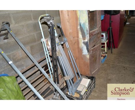 A wooden and metal step ladder; a clothing rail; a box of various sundry items etc