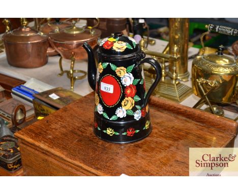 A floral painted enamel coffee pot 