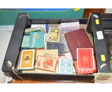 A box of playing cards and card games