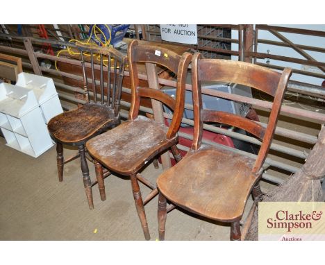 A pair of elm seated bar back chairs and stick back chair