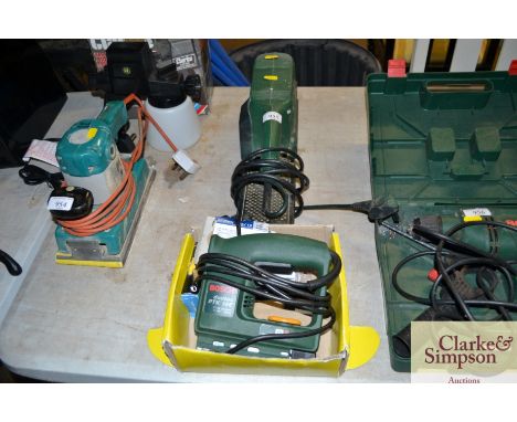 A Bosch belt sander together with a Bosch electric staple gun