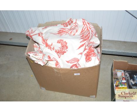 A box containing four matching curtains