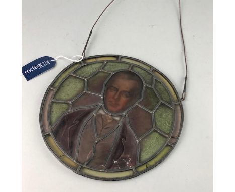 VICTORIAN STAINED AND PAINTED GLASS PANEL, decorated with a head and shoulders portrait of Sir Walter Scott, 25cm diameter