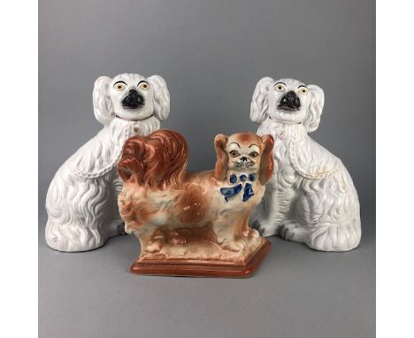 PAIR OF STONEWARE WALLY DOGS, 24cm high, along with another ceramic dog (3)