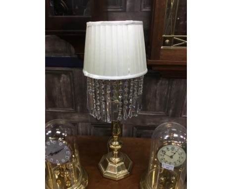 BRASS ELECTRIC TABLE LAMP, with fabric shade over a row of prismatic drops
