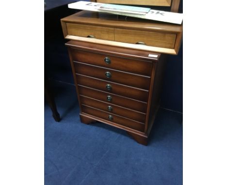 STAINED WOOD MINIATURE CHEST OF DRAWERS, 51cm wide, along with a stained wood dressing mirror and a carved wood wall shelf (3