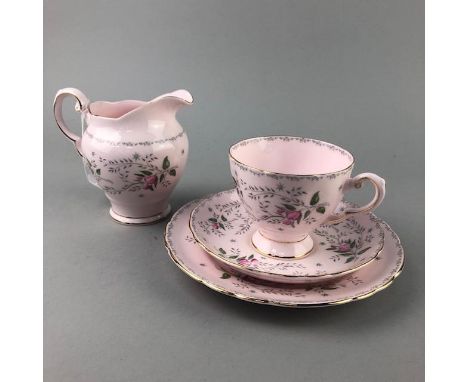 TUSCAN TEA SERVICE, with floral decoration on a pink ground, comprising approximately 42 pieces