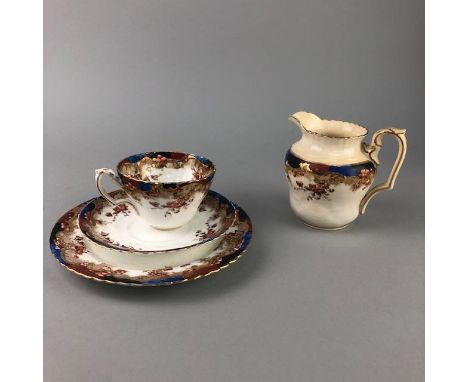 FLANDERS WAA &amp; CO PART TEA SERVICE, with foliate and gilt decoration, comprising eleven saucers, elen cups, sideplates, s