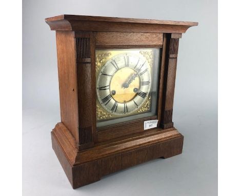EARLY 20TH CENTURY OAK CASED MANTEL CLOCK, 31cm high