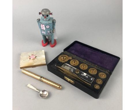 TIN PLATE ROBOT, along with a cased set of postal weights, a vanity mirror, perfume bottle and mother of pearl handled spoon