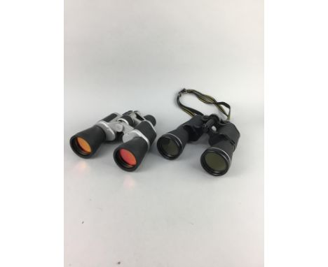 TWO PAIRS OF BINOCULARS, one in hard case, along with a polaroid camera and a table globe (4)