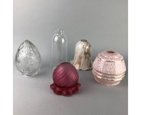 ART DECO STYLE MOTTLED PINK GLASS LAMP SHADE, with gilt decoration, 13cm high, along with other glass and crystal lamp shades