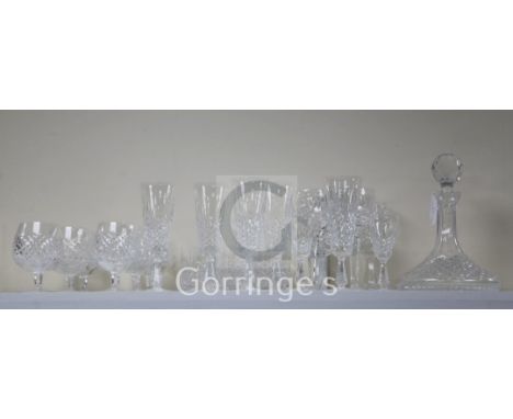 A Waterford cut crystal twenty six piece suite of drinking glasses and a ship's decanter with stopper