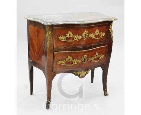 A Louis XVI marble topped and ormolu mounted serpentine commode, fitted with two drawers, on scroll supports, W.2ft 8in.