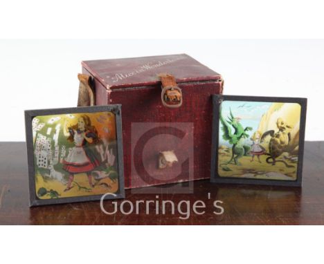 A set of twenty four Alice in Wonderland magic lantern slides, in original box