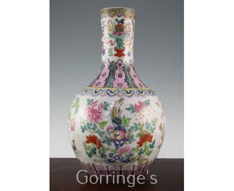 A large Chinese famille rose bottle vase, Daoguang period, painted with a pheasant and other birds amid flowers and foliage, 