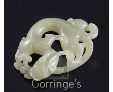 A Chinese celadon jade carving of a chi-dragon biting a sprig of lingzhi fungus, Qing dynasty, 6.9cm